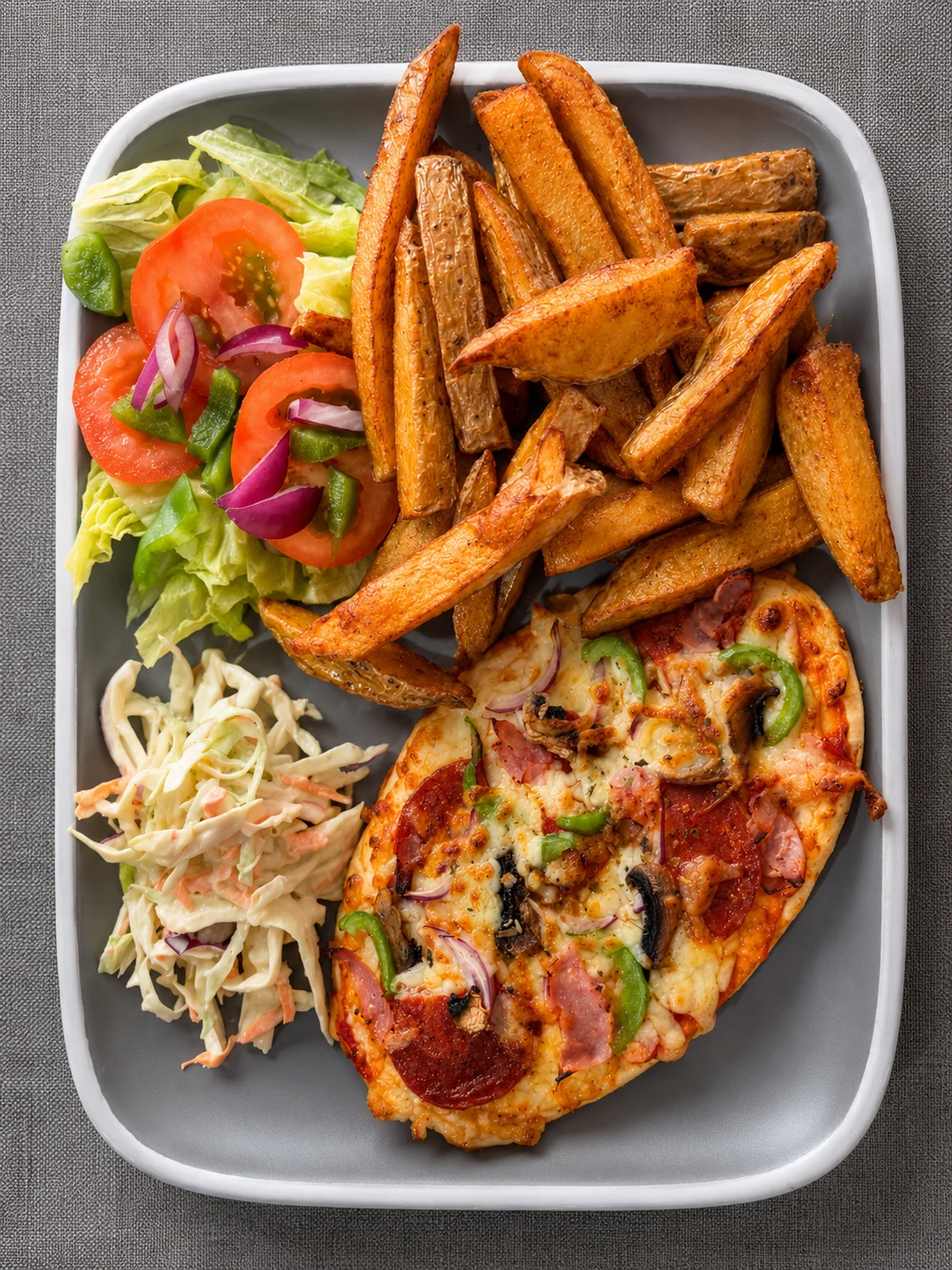 Pizza, chips and coleslaw at Gem Cafe Coxhoe