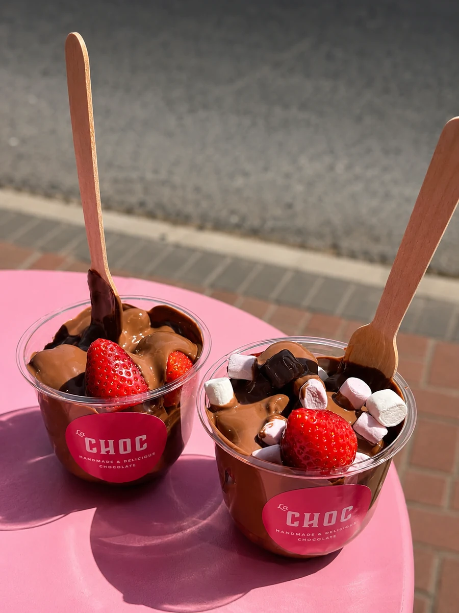 Chocolate dessert cups with strawberries and marshmallows